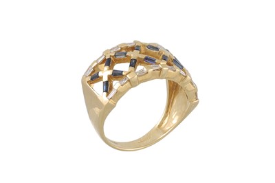 Lot 76 - A DIAMOND AND SAPPHIRE RING, of openwork...