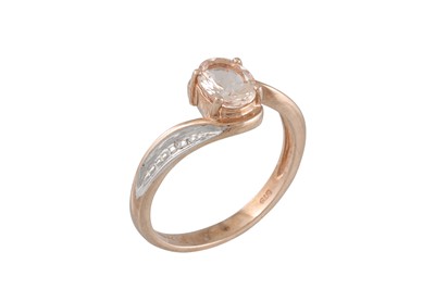 Lot 80 - A MORGANITE AND DIAMOND RING, the oval...