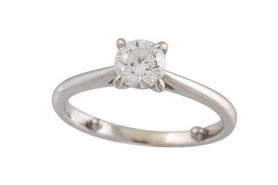 Lot 254 - A DIAMOND SOLITAIRE RING, mounted in 18ct...