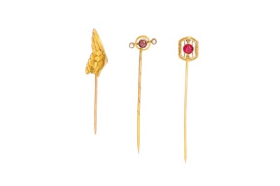 Lot 79 - A COLLECTION OF THREE GOLD PINS, one 18ct head...
