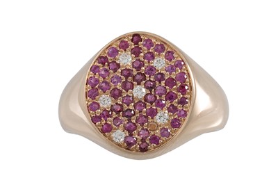 Lot 258 - A RUBY AND DIAMOND PAVÉ SET RING, mounted in...
