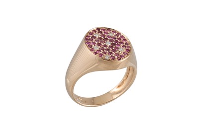 Lot 258 - A RUBY AND DIAMOND PAVÉ SET RING, mounted in...