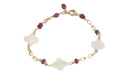 Lot 266 - A ROCK CRYSTAL AND RUBY BEAD BRACELET, 18ct...