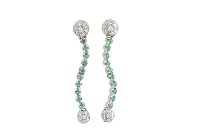 Lot 282 - A PAIR OF DIAMOND AND EMERALD LINE EARRINGS,...