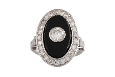 Lot 409 - AN ONYX AND DIAMOND PLAQUE RING, the old cut...
