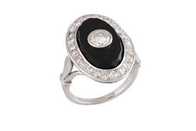 Lot 232 - AN ONYX AND DIAMOND PLAQUE RING, the old cut...