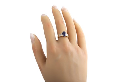 Lot 235 - A SAPPHIRE SINGLE STONE RING, the oval...