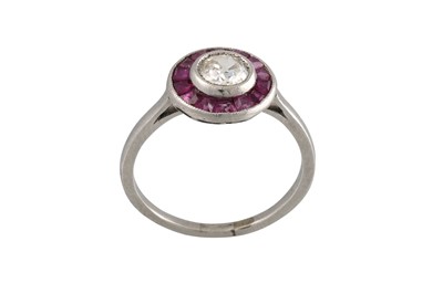 Lot 236 - AN ART DECO DIAMOND AND RUBY TARGET CLUSTER...