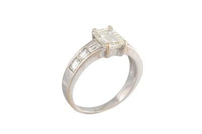 Lot 240 - A DIAMOND SOLITAIRE RING, the emerald cut...