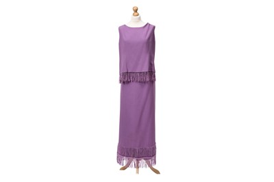 Lot 89 - A LILAC FRINGED CREPE SUIT, comprising of a...
