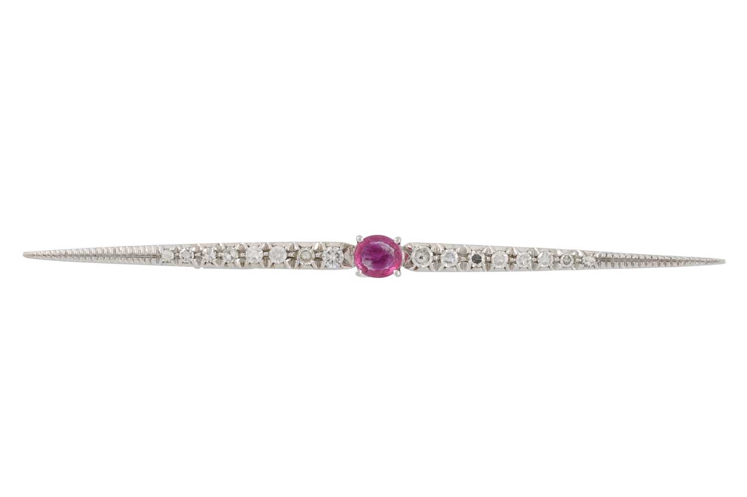 Lot 212 - A DIAMOND AND RUBY BAR BROOCH, the oval ruby...