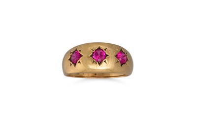 Lot 190 - A THREE STONE RUBY RING, mounted in 9ct gold;...
