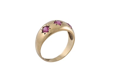 Lot 2 - A THREE STONE RUBY RING, mounted in 9ct gold;...