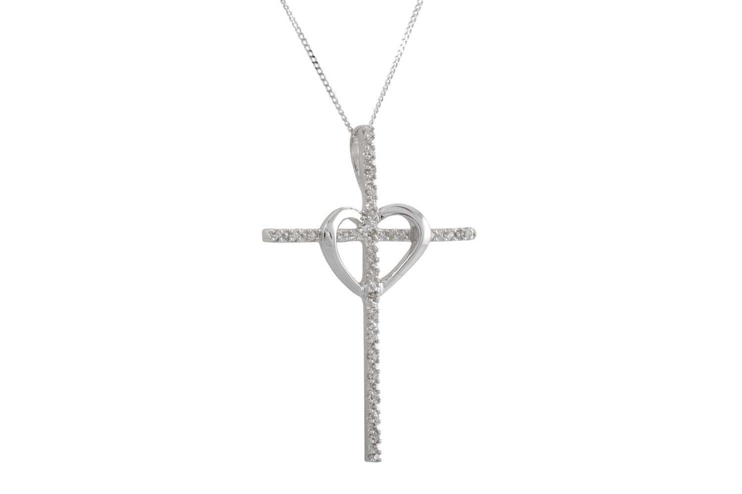 Lot 20 - A DIAMOND SET CROSS, mounted in white gold, on...