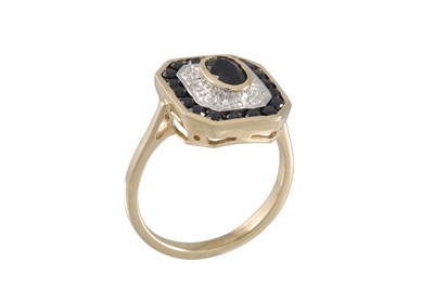 Lot 31 - A DIAMOND AND SAPPHIRE CLUSTER RING, of...