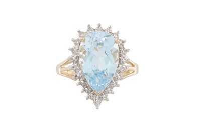 Lot 60 - A DIAMOND AND TOPAZ CLUSTER RING, pear shaped,...