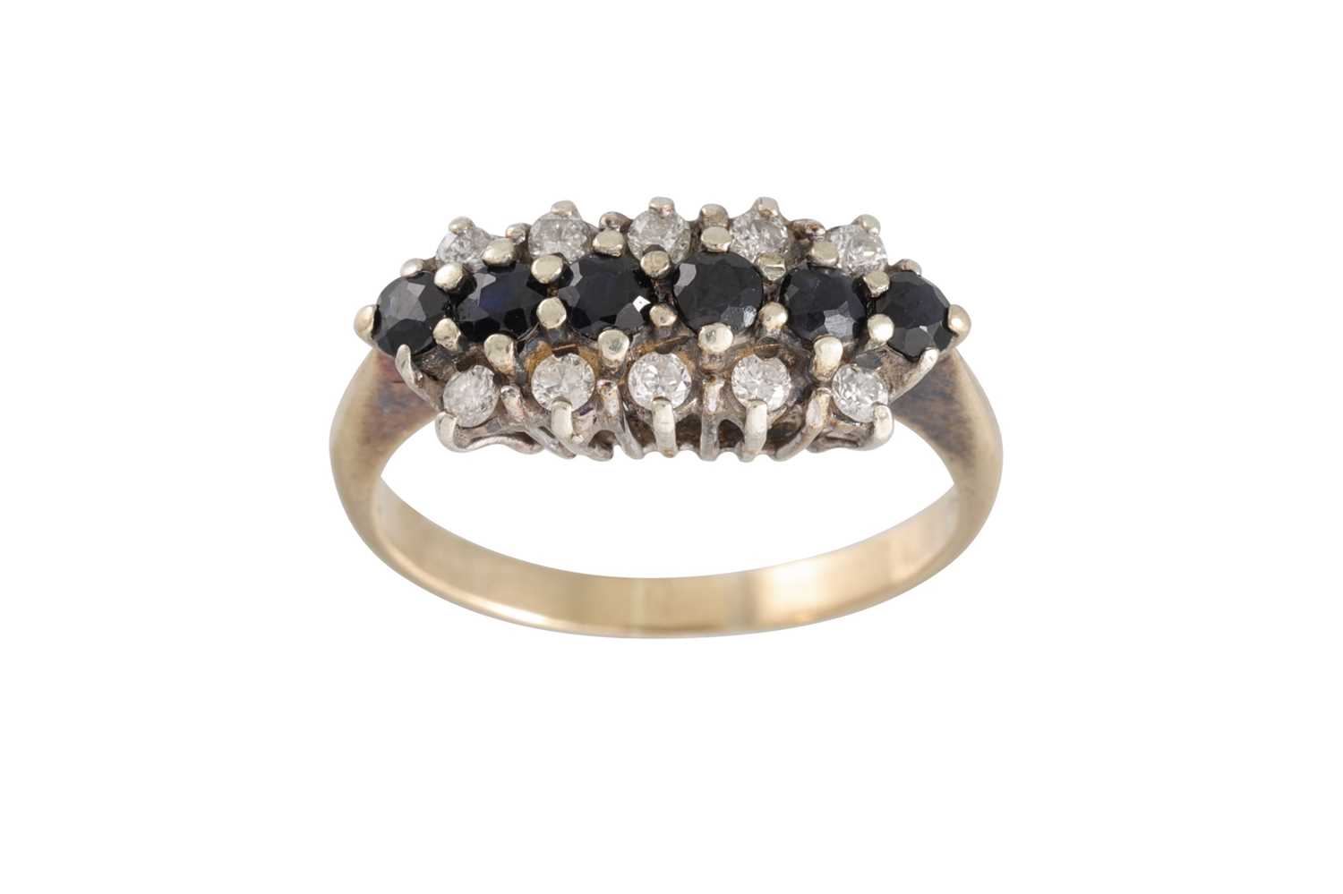 Lot 74 - A SAPPHIRE AND DIAMOND THREE ROWED RING,...