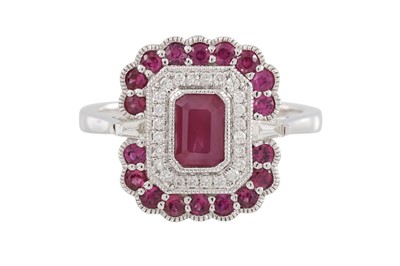 Lot 78 - A DIAMOND AND RUBY CLUSTER RING, of...