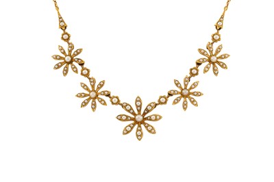 Lot 408 - AN EDWARDIAN 15CT GOLD AND SEED PEARL NECKLACE,...