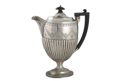 Lot 515 - A VICTORIAN SILVER ENGRAVED COFFEE POT, of Neo-...
