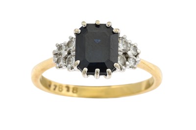 Lot 200 - A SAPPHIRE AND DIAMOND CLUSTER RING, mounted...