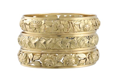 Lot 398 - A SET OF THREE ART NOUVEAU BANGLES, embossed...