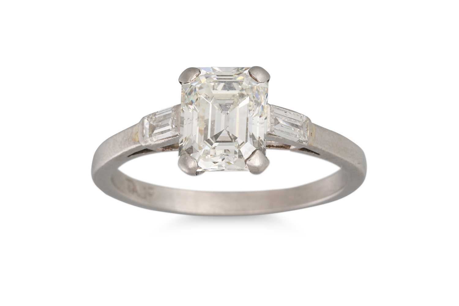 Lot 222 - A DIAMOND SOLITAIRE RING, the emerald cut...