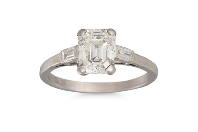 Lot 392 - A DIAMOND SOLITAIRE RING, the emerald cut...
