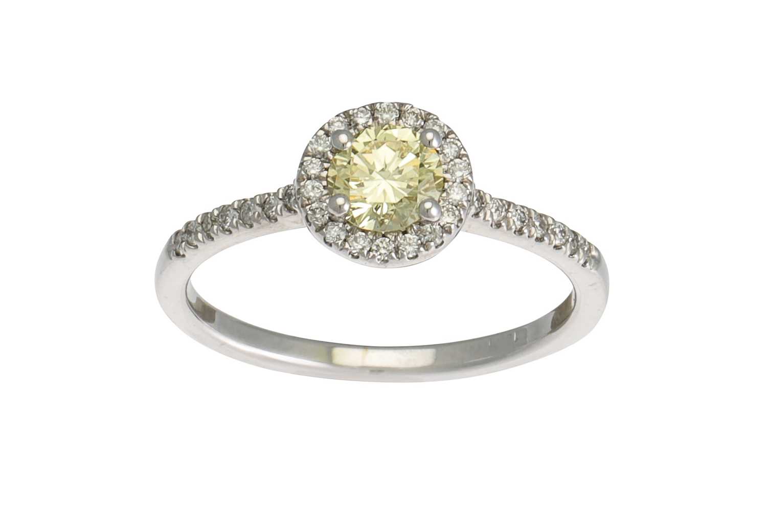 Lot 251 - A FANCY YELLOW DIAMOND SOLITAIRE RING, with...