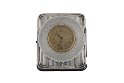 Lot 493 - AN ART DECO SILVER TABLE CLOCK, dated...