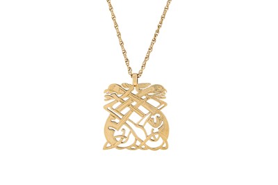 Lot 316 - A CELTIC PENDANT, mounted in 9ct yellow gold...