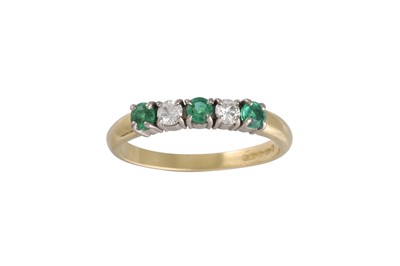 Lot 245 - A DIAMOND AND EMERALD FIVE STONE RING, mounted...