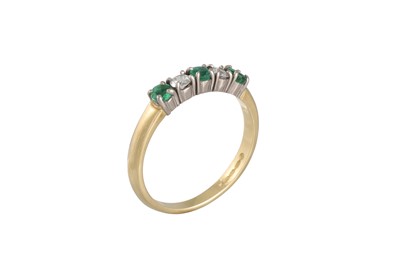 Lot 245 - A DIAMOND AND EMERALD FIVE STONE RING, mounted...