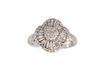 Lot 337 - A DIAMOND CLUSTER DRESS RING, set with round...