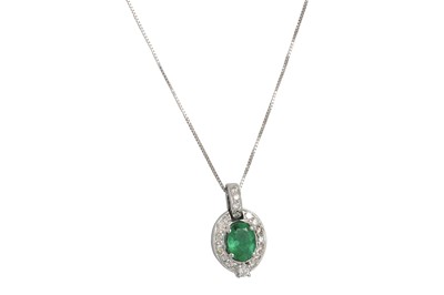 Lot 321 - A EMERALD AND DIAMOND CLUSTER PENDANT, the...