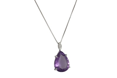 Lot 323 - AN AMETHYST AND DIAMOND PENDANT, the large...