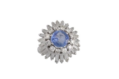 Lot 246 - A DIAMOND AND SAPPHIRE CLUSTER RING, the...