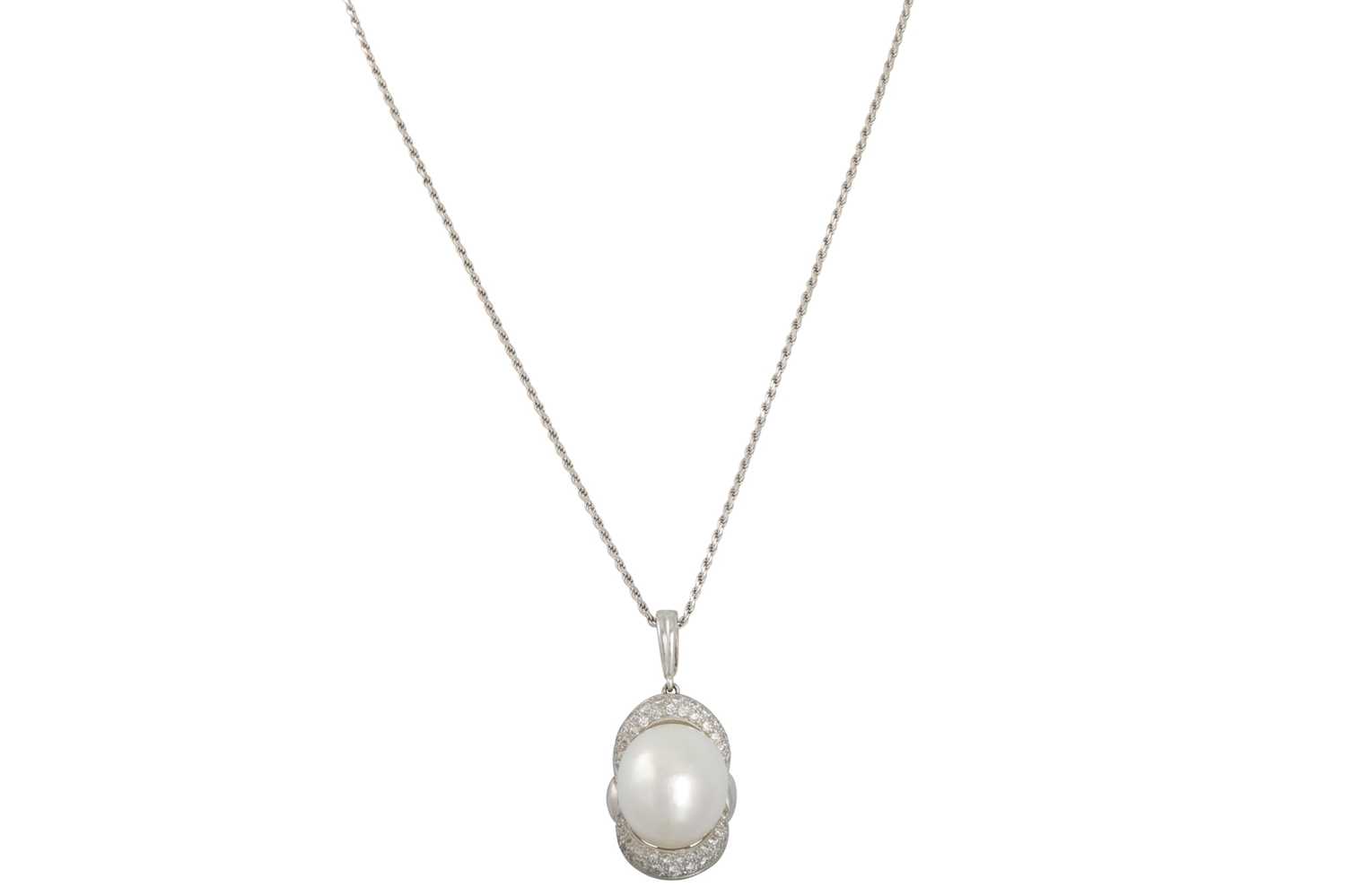 Lot 250 - A PEARL AND DIAMOND PENDANT, the large pearl...