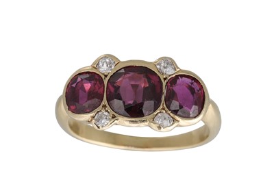 Lot 270 - A RUBY AND DIAMOND RING, the three rubies...