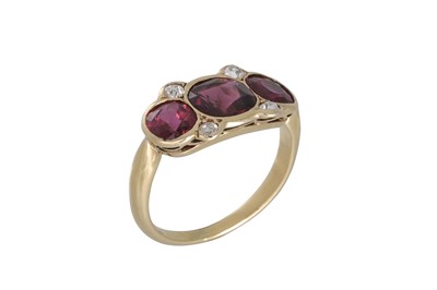 Lot 270 - A RUBY AND DIAMOND RING, the three rubies...
