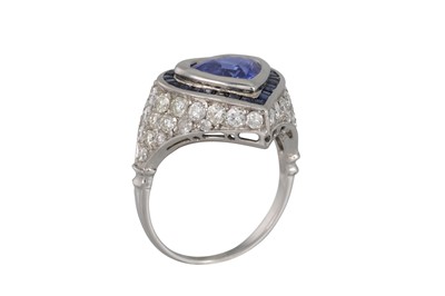 Lot 387 - A SAPPHIRE AND DIAMOND CLUSTER RING, the heart...