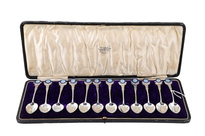 Lot 528 - A CASED SET OF TWELVE GEORGE V SILVER ENAMEL...