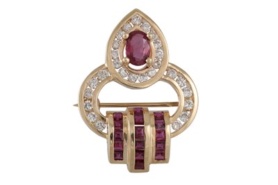 Lot 305 - A RUBY AND DIAMOND BROOCH, of shaped form,...