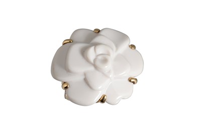 Lot 112 - A CHANEL CAMELIA RING, in white ceramic, with...
