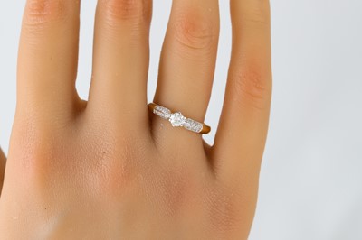 Lot 50 - A DIAMOND SOLITAIRE RING, set with diamond...