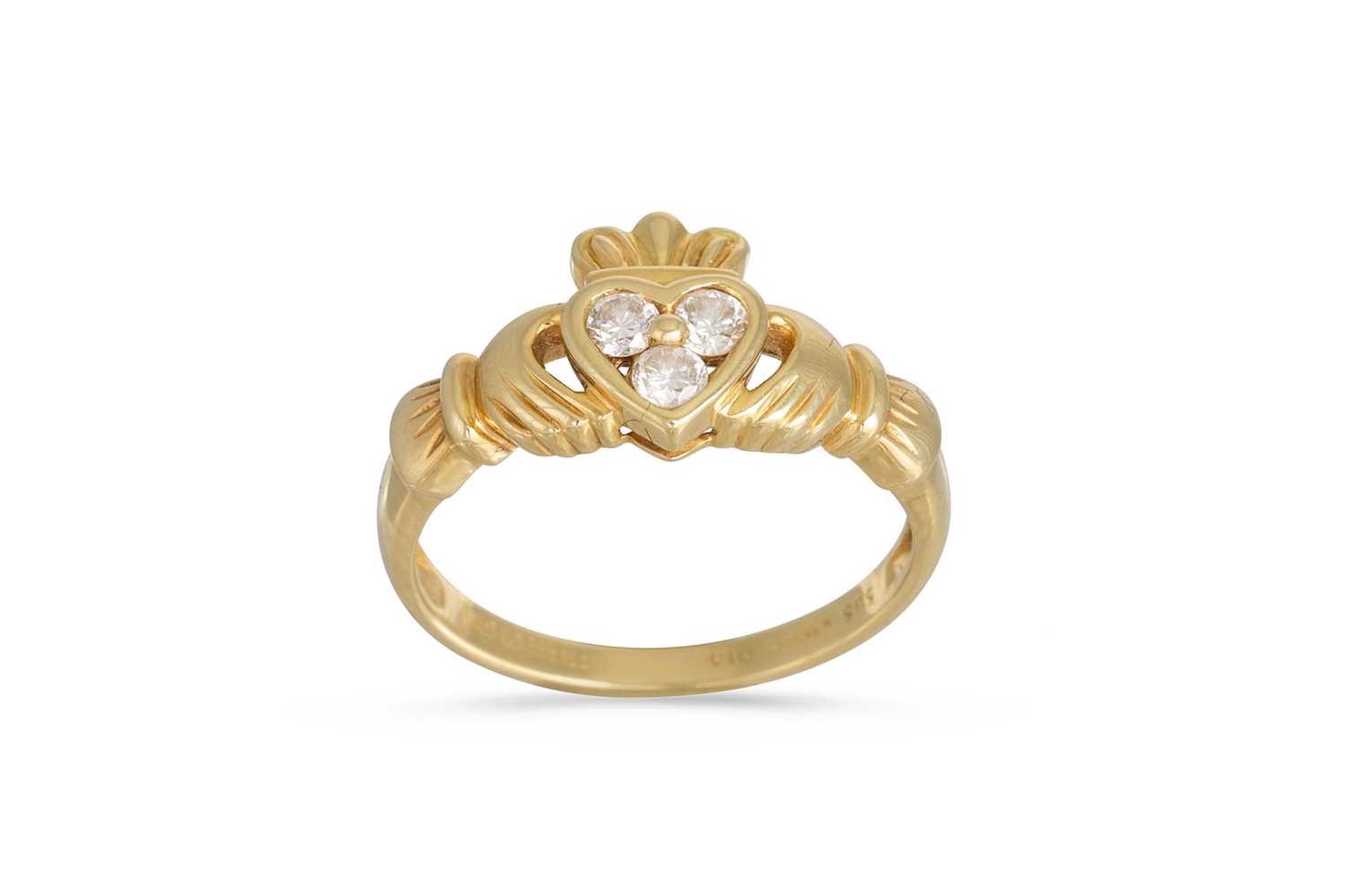 Lot 19 - A 14CT GOLD CLADDAGH RING, set with three...