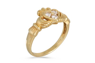 Lot 19 - A 14CT GOLD CLADDAGH RING, set with three...