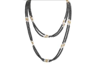Lot 128 - THREE NECKLACES, to include, a hematite...