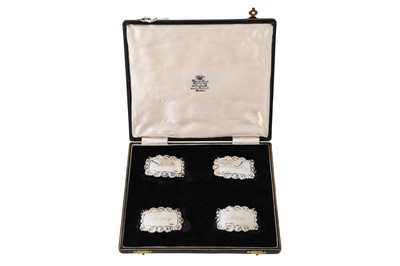 Lot 511 - A CASED SET OF FOUR IRISH SILVER DECANTER...