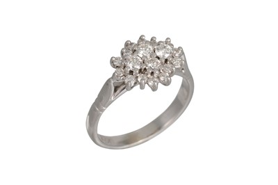 Lot 49 - A DIAMOND CLUSTER DRESS RING, mounted in 18ct...